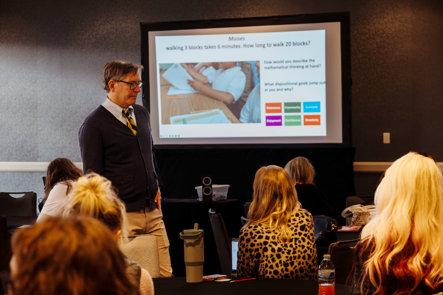 A speaker at a KCM Conference interactiving with attendees
